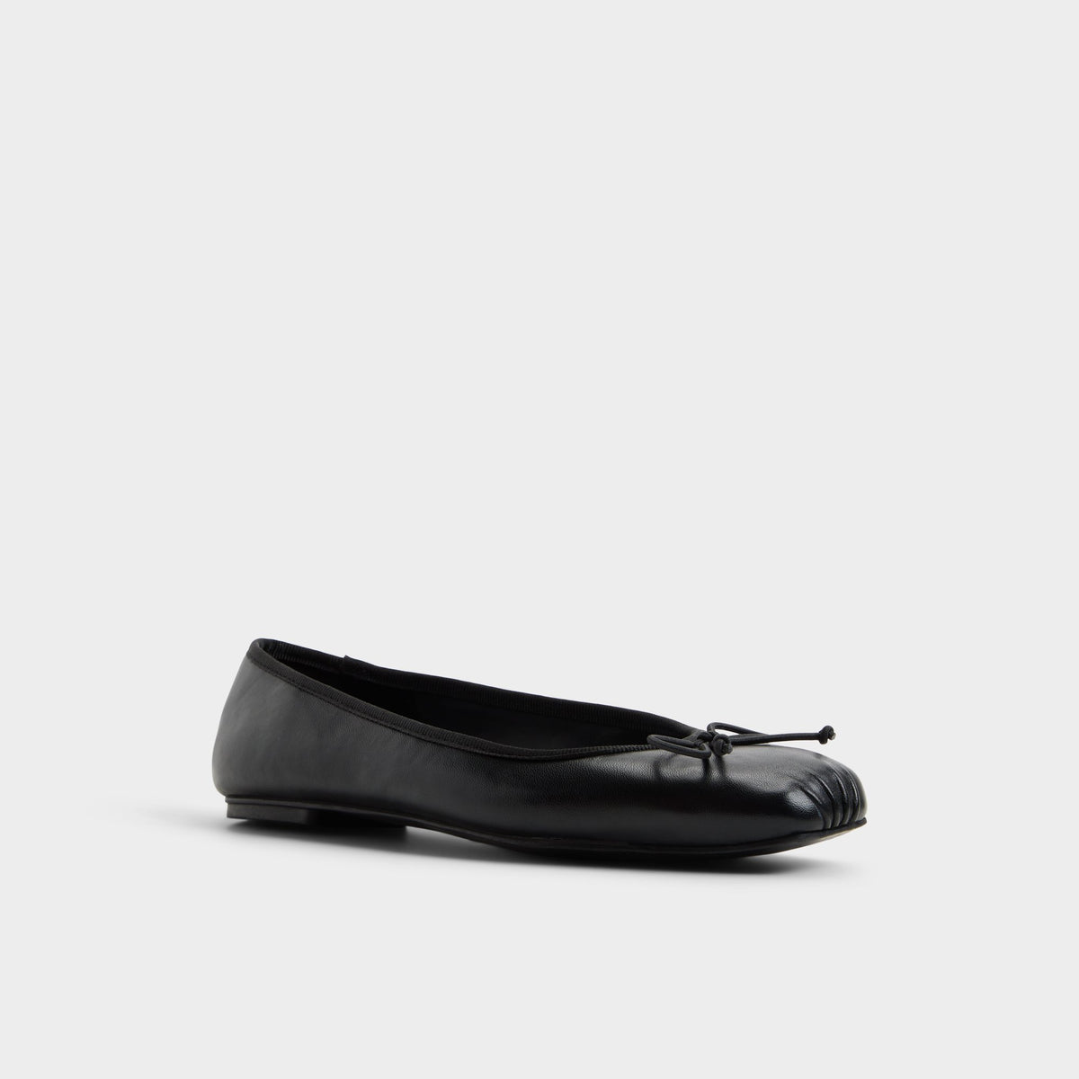Three-quarter angle of Black Olllie Ballet flat's front side