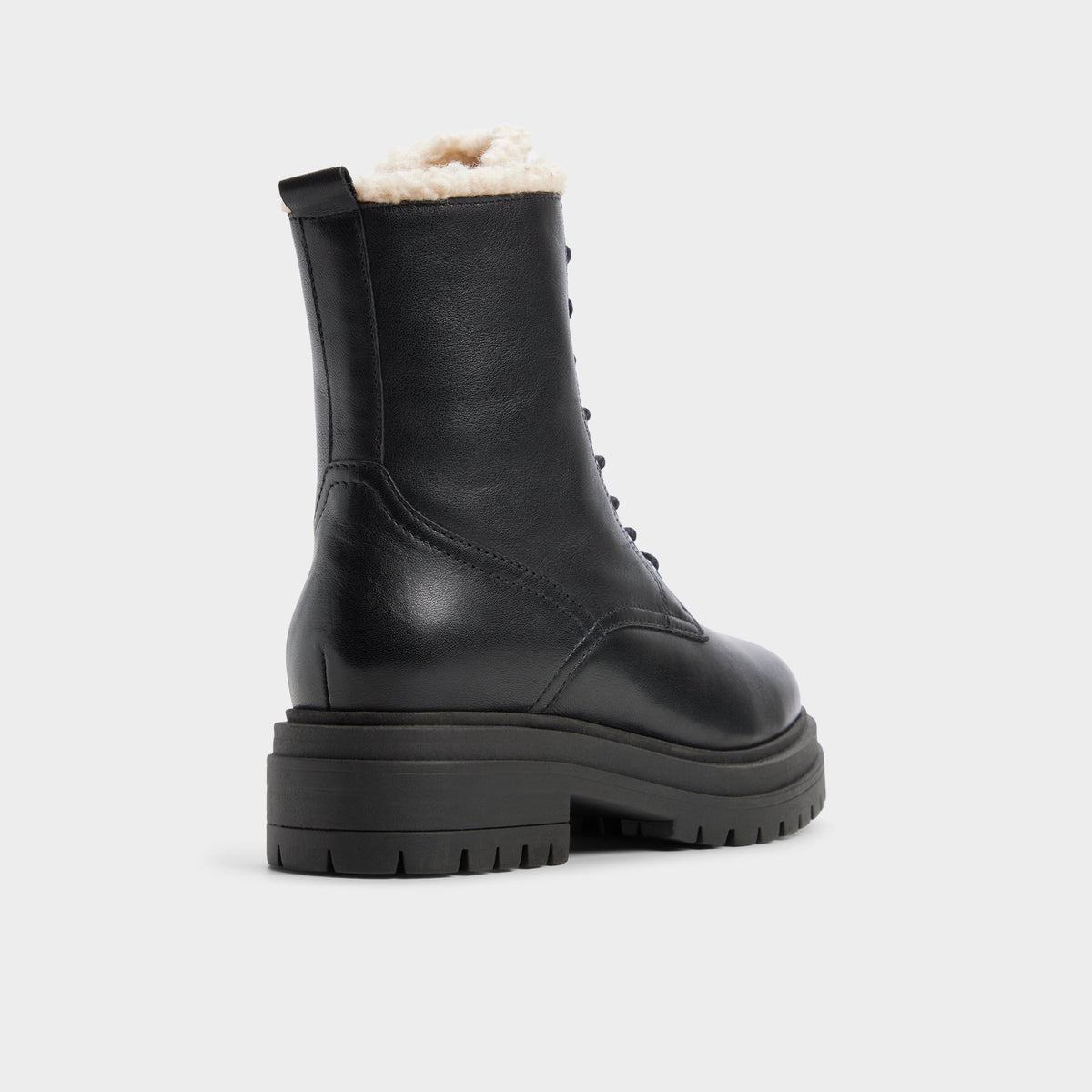 Three-quarter angle of Black Mirabelle Lug sole combat boot's back side
