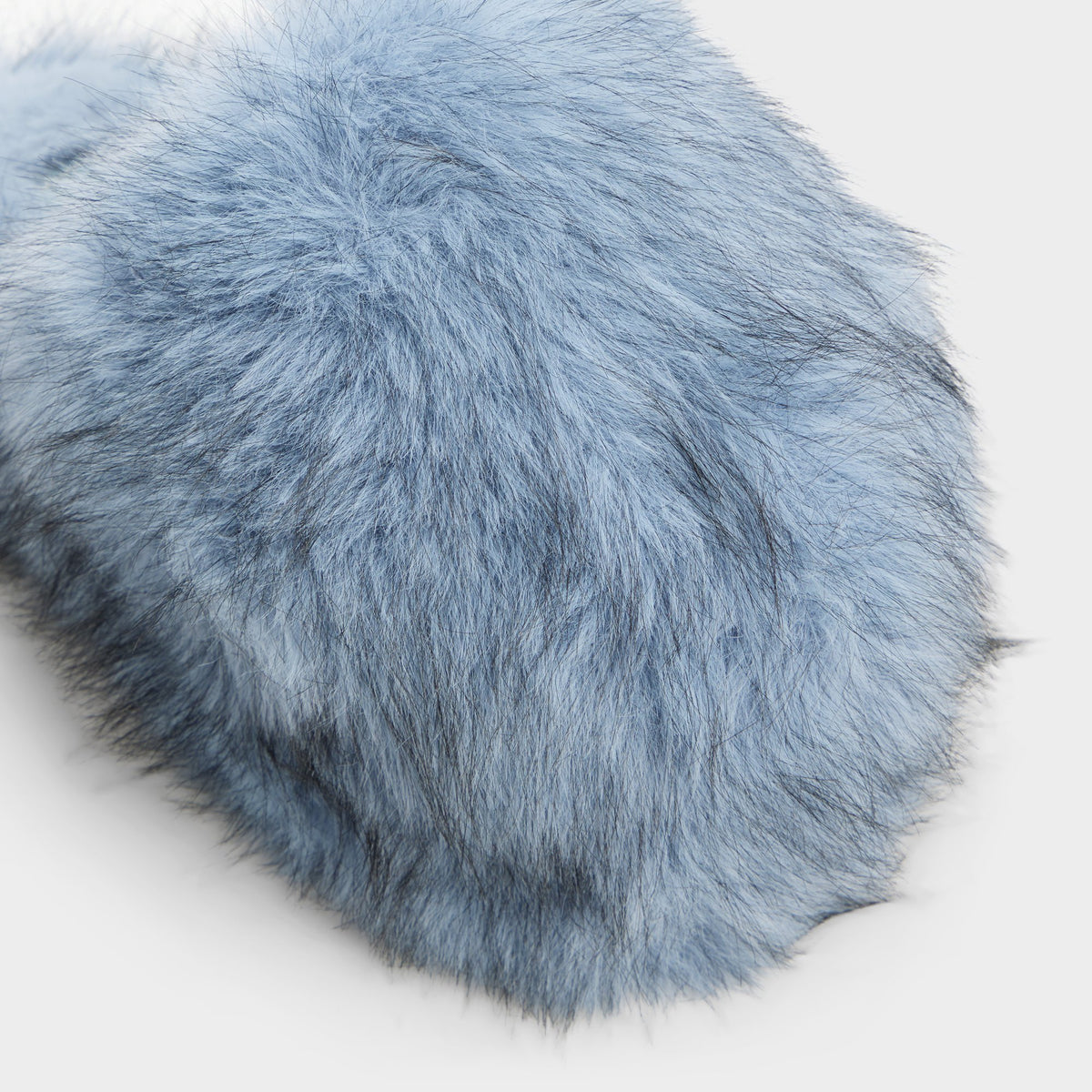 Three-quarter angle of Medium blue Fluffey 's front side