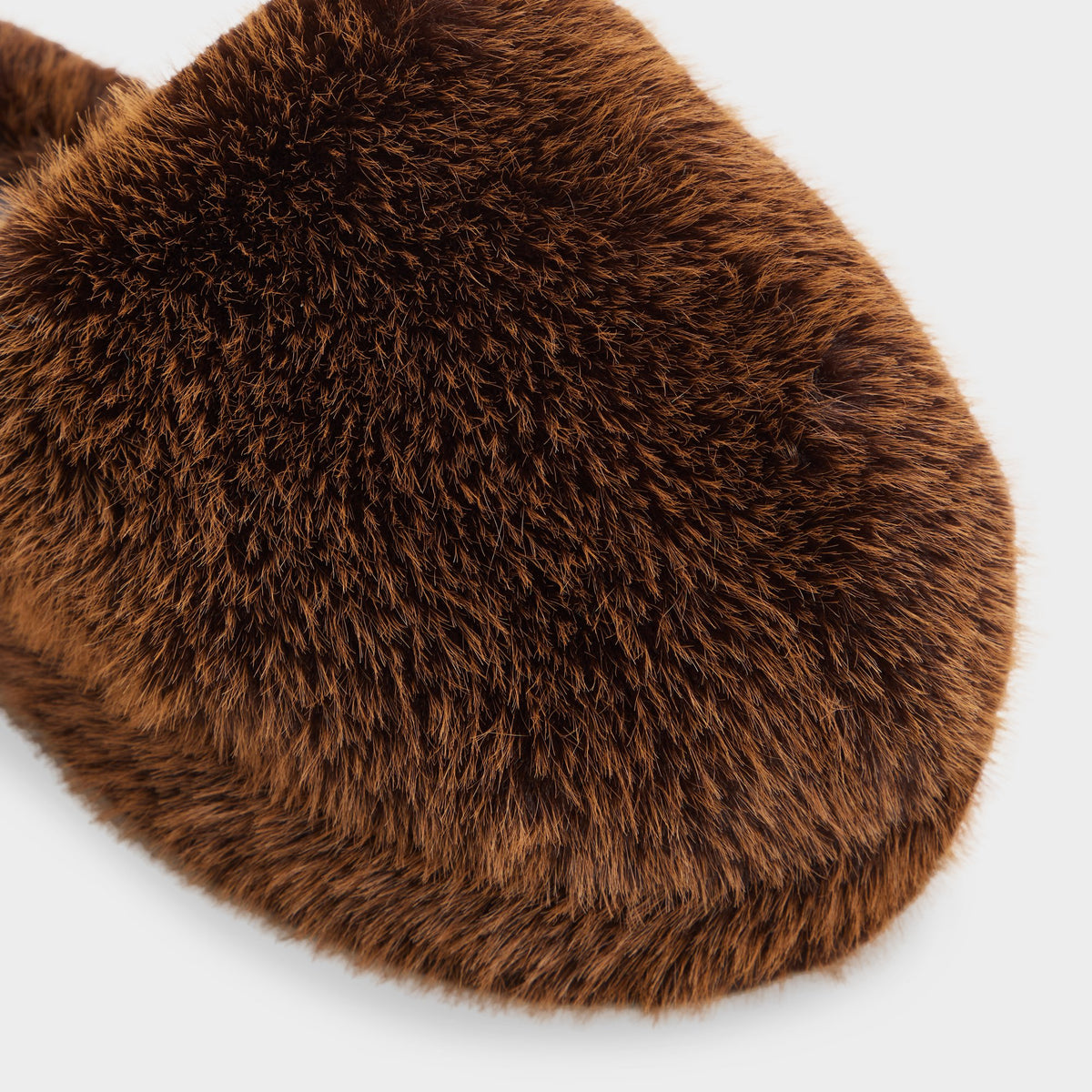 Three-quarter angle of Dark brown Fluffey 's front side