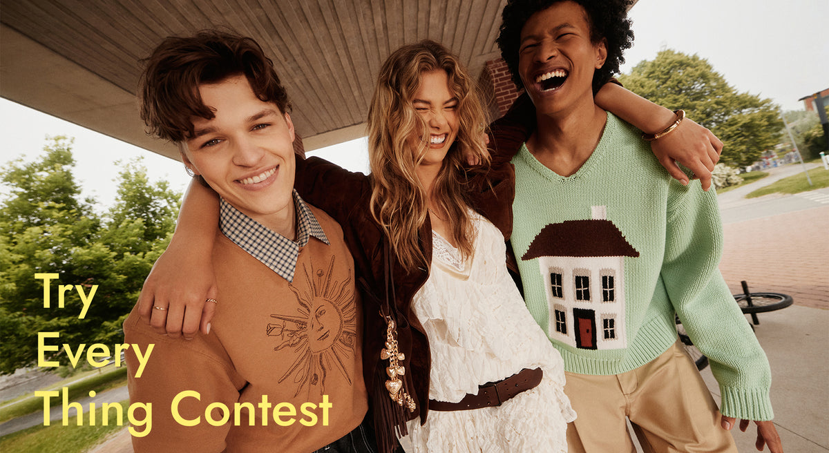 Three people standing together with a text overlay 'Try Every Thing Contest'.